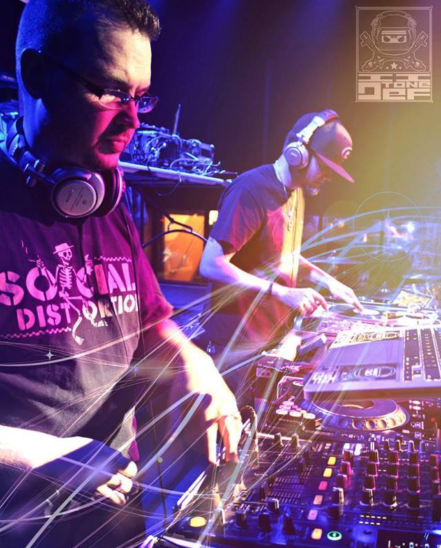 Image of II Tone Def, two Atlatna DJs, performing at a club